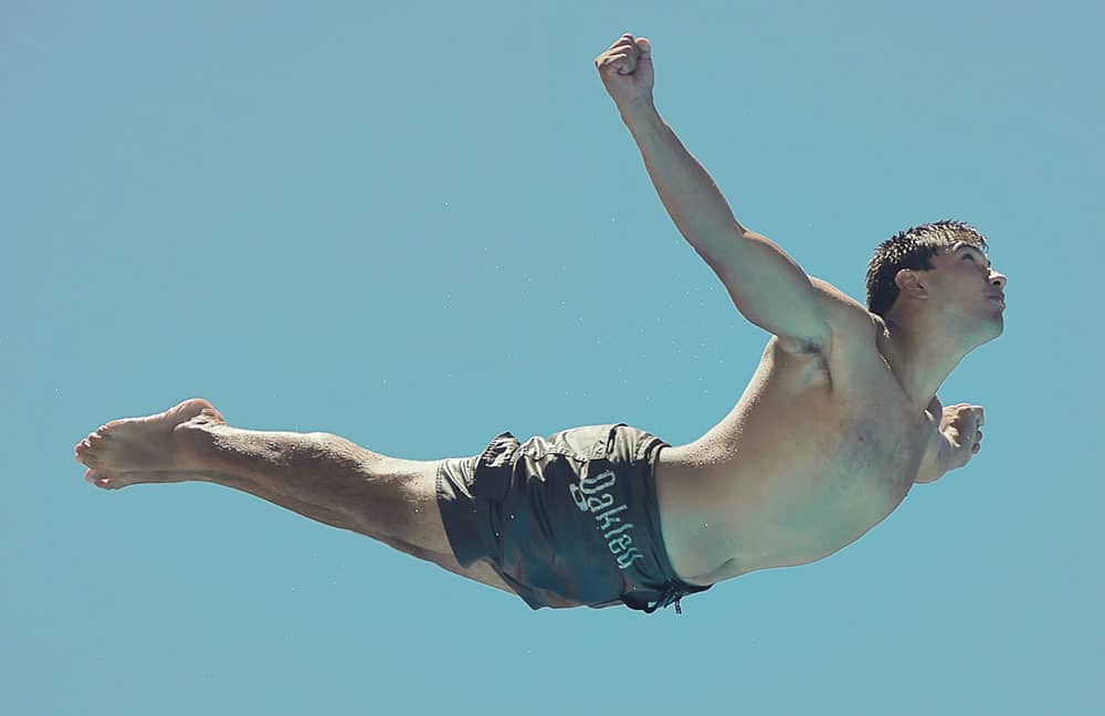 Man Diving Through Air
