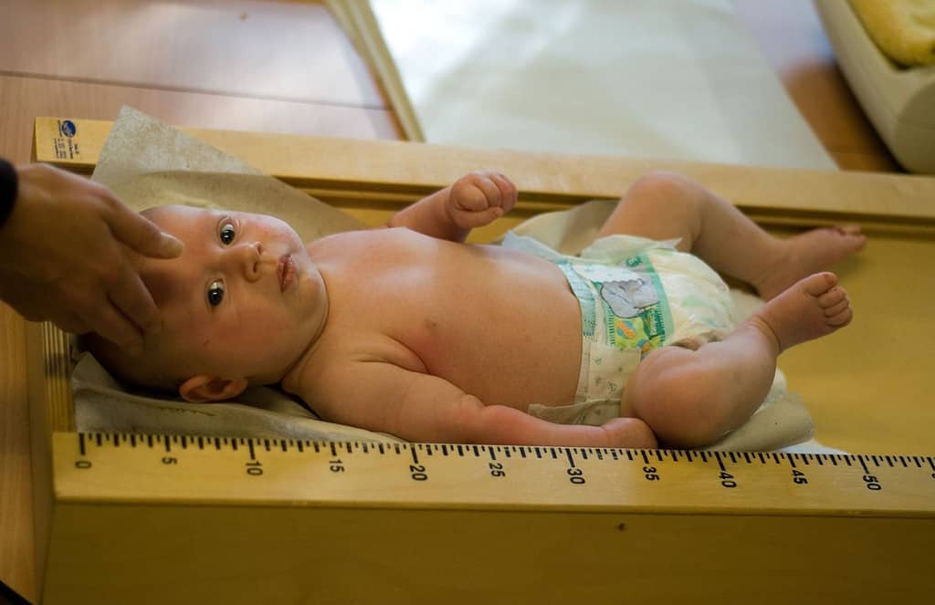 Baby being measured for growth