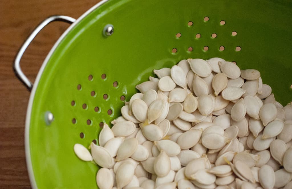Green strainer for washing raw pumpkin seeds