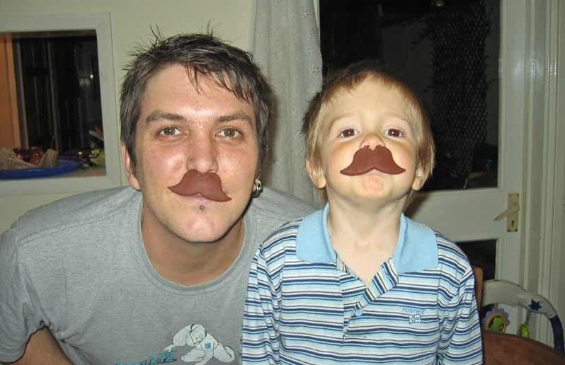 Dad joking with son